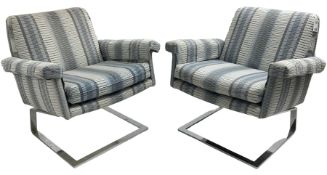 Pair of mid-20th century cantilever armchairs