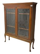 Early 20th century walnut display cabinet