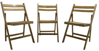 Set of three mid-to-late 20th century hardwood folding chairs
