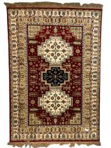 Indian woollen crimson ground rug