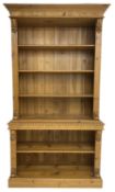 Polished pine and elm bookcase