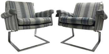 Pair of mid-20th century cantilever armchairs
