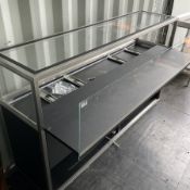 Large display cabinet with glas pull out display drawer