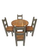 Solid oak round panted dining table and four chairs