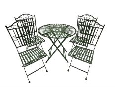 Wrought metal slatted round folding garden table and four chairs in green finish