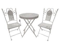 Wrought iron mesh style round bistro table and two chairs in white finish