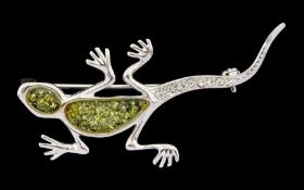 Silver green amber and cubic zirconia lizard brooch