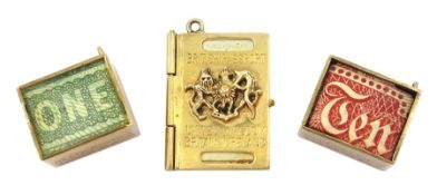 Three 9ct gold pendant / charms including two money boxes and a passport