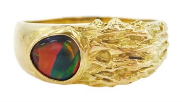 18ct gold single stone black opal textured design ring