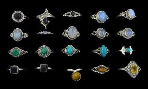 Twenty silver stone set rings including turquoise