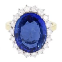 18ct gold oval cut unheated sapphire and round brilliant cut diamond ring