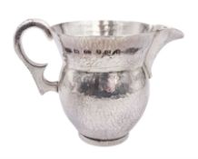 Modern Arts and Crafts style silver jug