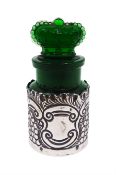 Edwardian silver mounted green glass scent bottle