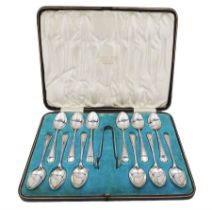 Set of twelve Edwardian silver teaspoons and a pair of matching sugar tongs