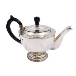 Modern Arts and Crafts style silver teapot