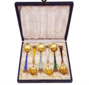 Set of six Danish silver-gilt harlequin enamel demitasse spoons with crown finials