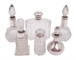 Six silver mounted cut glass dressing table bottles