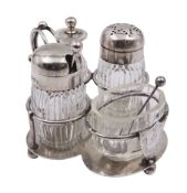 Late Victorian silver mounted four piece cut glass cruet set on stand