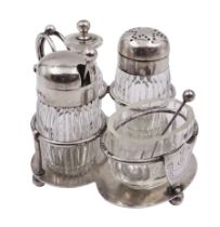 Late Victorian silver mounted four piece cut glass cruet set on stand