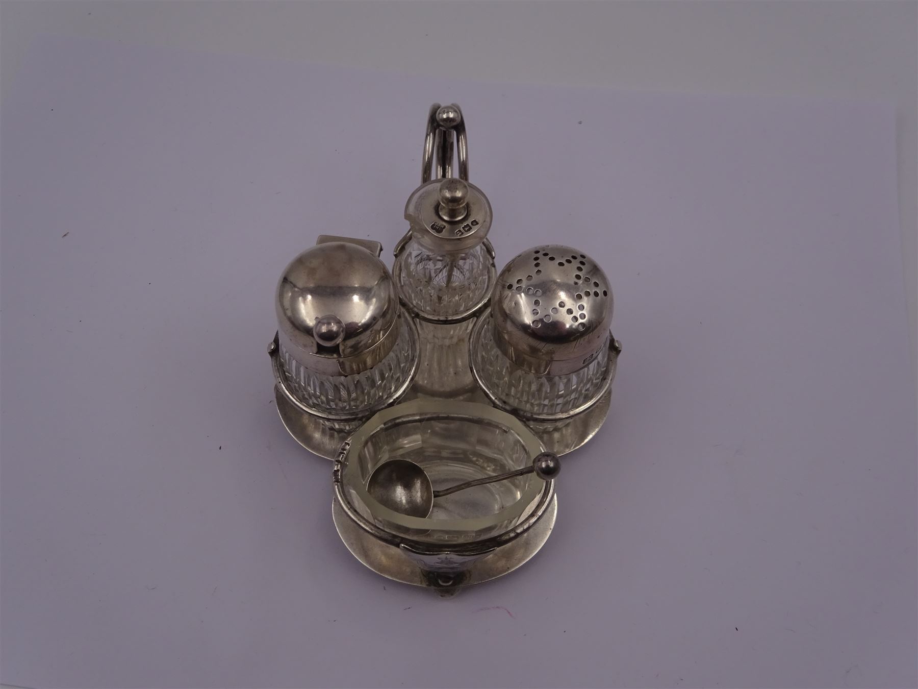 Late Victorian silver mounted four piece cut glass cruet set on stand - Image 4 of 7