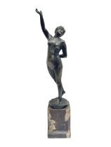 Bronzed nude female figure