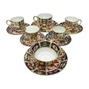 Six Royal Crown Derby cups and saucers all in imari pattern 2451