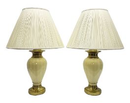 Pair of cream metal lamps