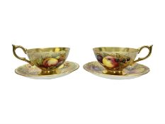Pair Aynsley Orchard Gold pattern teacups and saucers with gilt interior