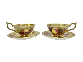 Pair Aynsley Orchard Gold pattern teacups and saucers with gilt interior