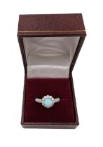 Silver opal and cubic zirconia flower cluster ring