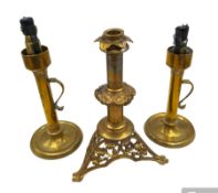 Brass candlestick with a knopt stems and triform base