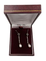 Pair of silver pearl and marcasite pendant stud earrings