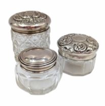 Three cut glass dressing table jars