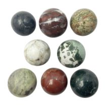 Eight mineral specimens spheres