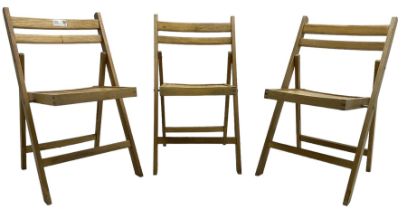 Set of three mid-to-late 20th century hardwood folding chairs