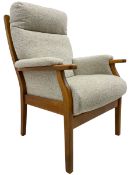 Stained beech framed high seat upholstered armchair
