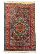 Persian design blue ground rug