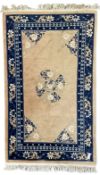 Chinese washed woollen peach ground rug