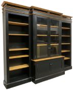 Contemporary polished pine and black finish break-front bookcase