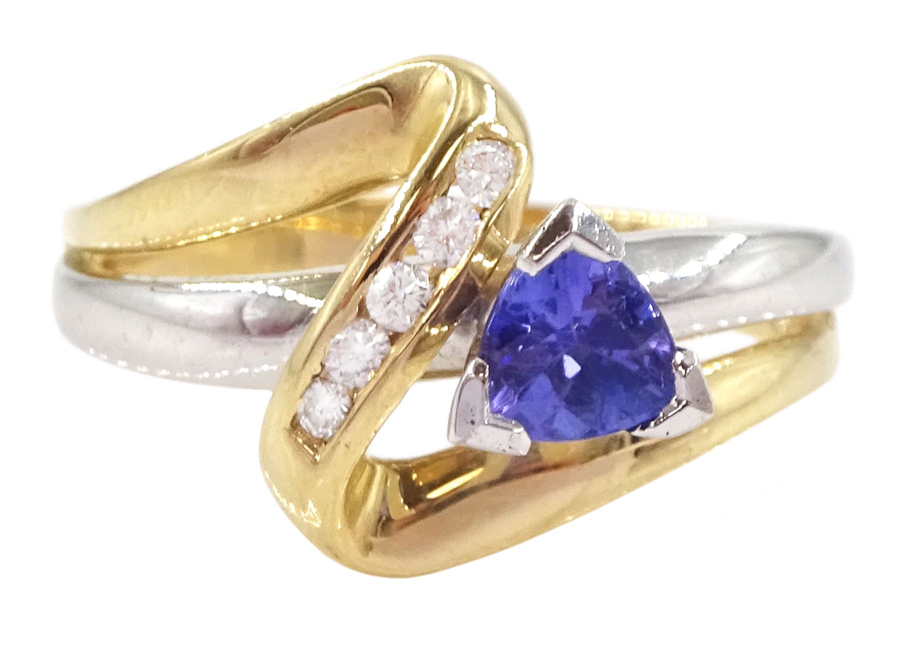 14ct white and yellow gold trillion cut tanzanite and round brilliant cut diamond crossover ring