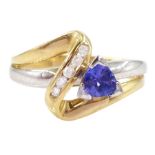 14ct white and yellow gold trillion cut tanzanite and round brilliant cut diamond crossover ring