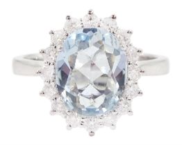 18ct white gold oval cut aquamarine and round brilliant cut diamond cluster ring