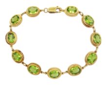 9ct gold peridot oval link bracelet