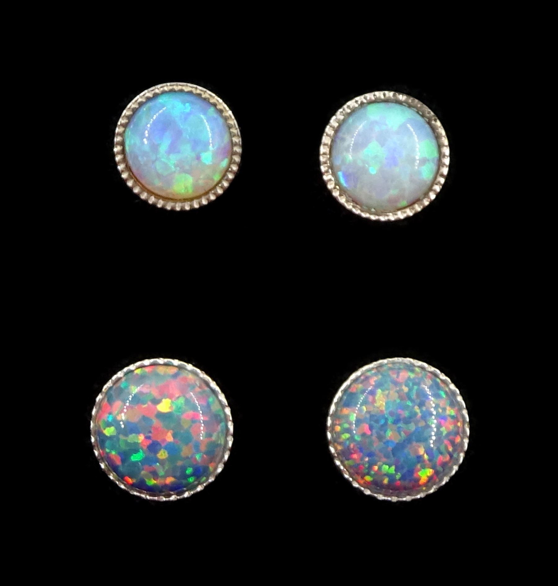 Two pairs of silver opal stud earrings