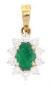 18ct gold oval cut emerald and round brilliant cut diamond pendant
