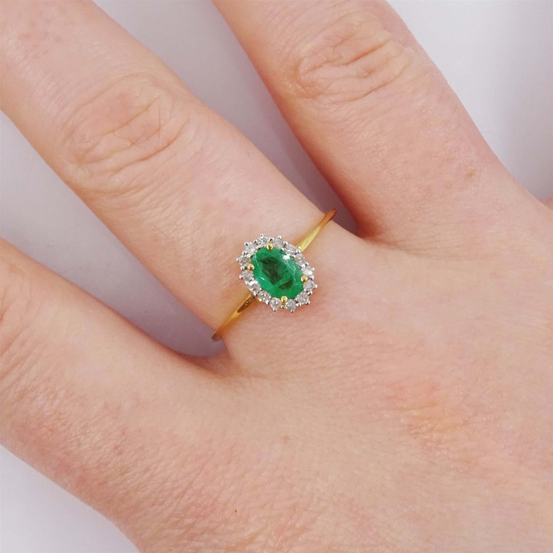 18ct gold oval cut emerald and round brilliant cut diamond cluster ring - Image 2 of 4