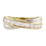 14ct white and yellow gold channel set cubic zirconia crossover ring