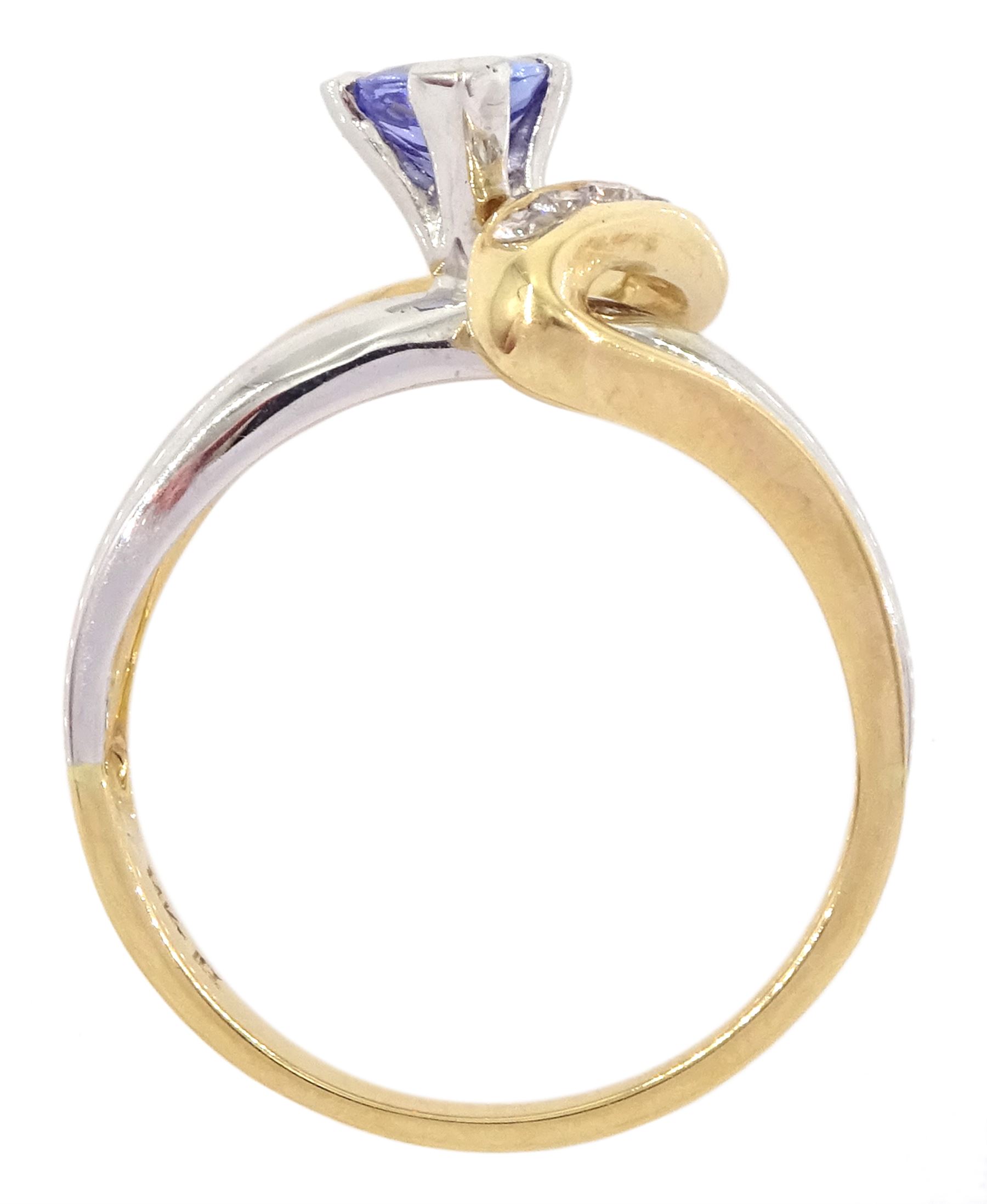 14ct white and yellow gold trillion cut tanzanite and round brilliant cut diamond crossover ring - Image 4 of 4