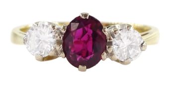 18ct gold three stone oval cut ruby and round brilliant cut diamond ring