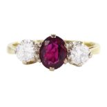 18ct gold three stone oval cut ruby and round brilliant cut diamond ring